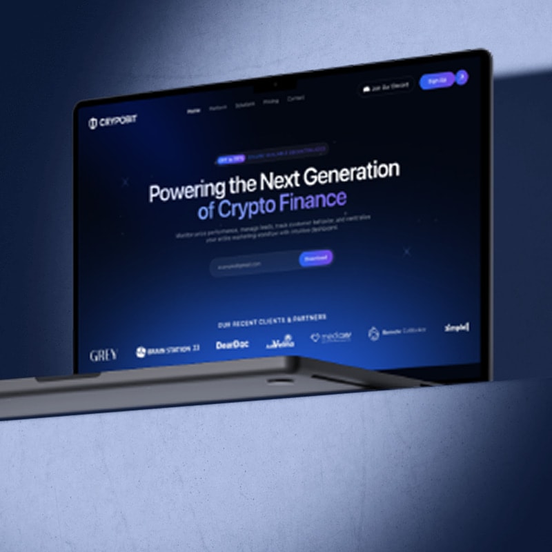 The CRYPOBIT trading interface open on a laptop resting on a lit shelf