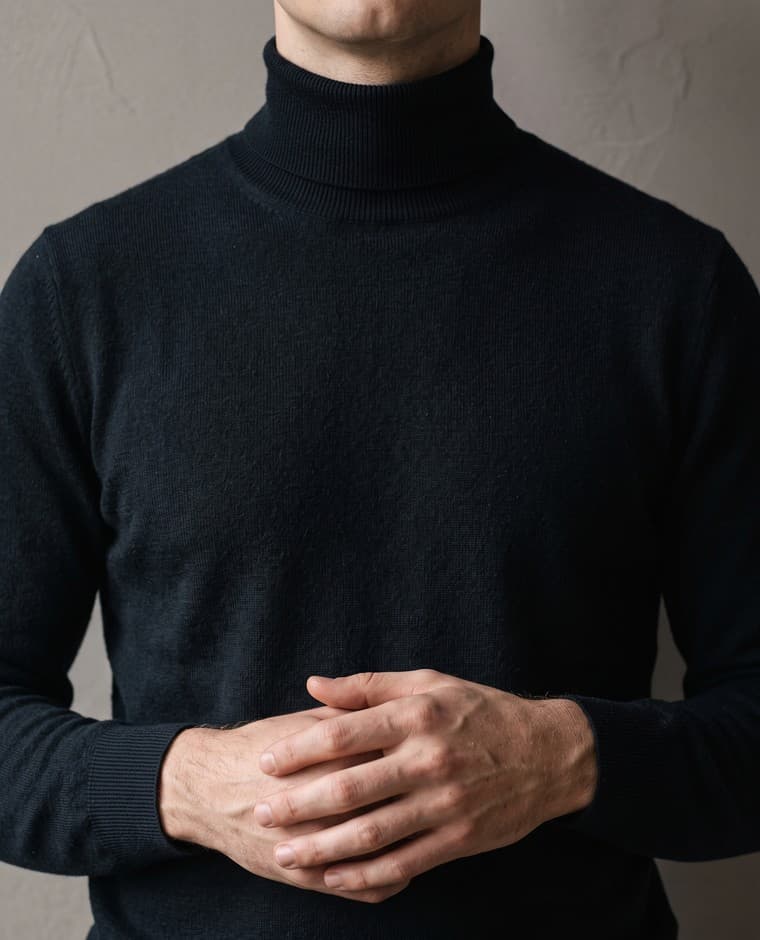 Portrait in a dark turtleneck